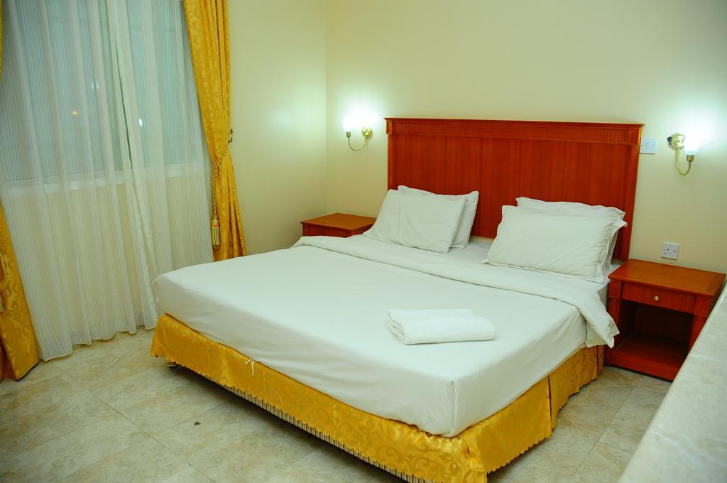 Al Faisal Hotel Suites Sur Bilik gambar