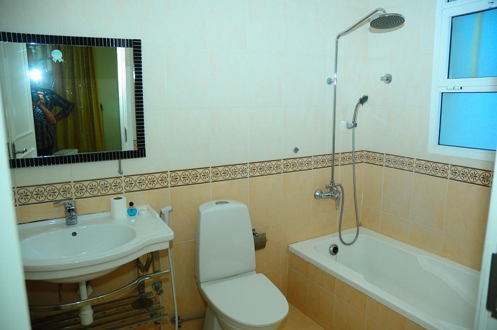 Al Faisal Hotel Suites Sur Bilik gambar